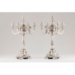 A pair of five branch candelabra