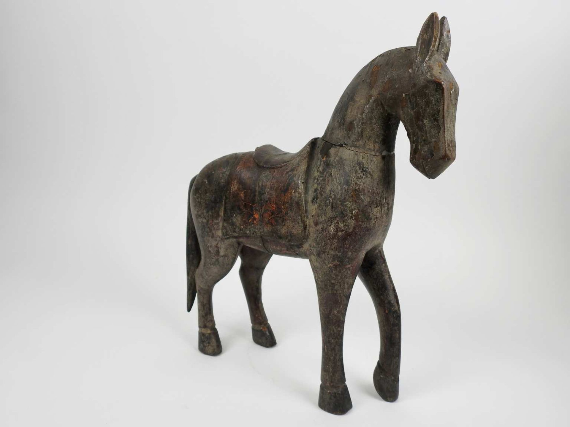 ChineCheval en bois sculpté38 x 35 cmTraces de polychromie <