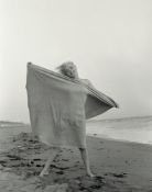 George Barris. Marilyn Monroe in Santa Monica Beach in July. 1962