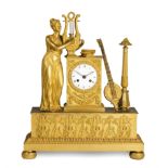 OROLOGIO D'APPOGGIO IN BRONZO DORATO CON ALLEGORIA DELLA MUSICA, FRANCIA, 1840 CIRCA