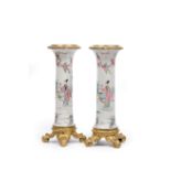 A PAIR OF FAMILLE ROSE PORCELAIN TRUMPET VASES, CHINA, 18TH CENTURY, WITH EUROPEAN BRONZE MOUNT