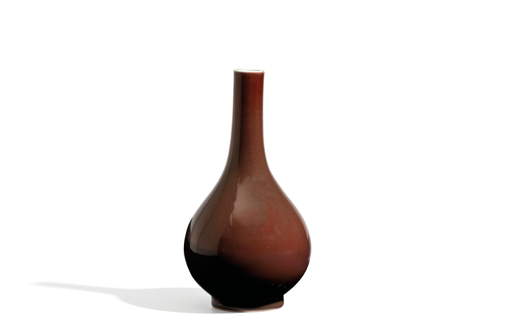A SMALL COPPER-RED GLAZED PEAR-SHAPED BOTTLE VASE, CHINA, 18TH CENTURY