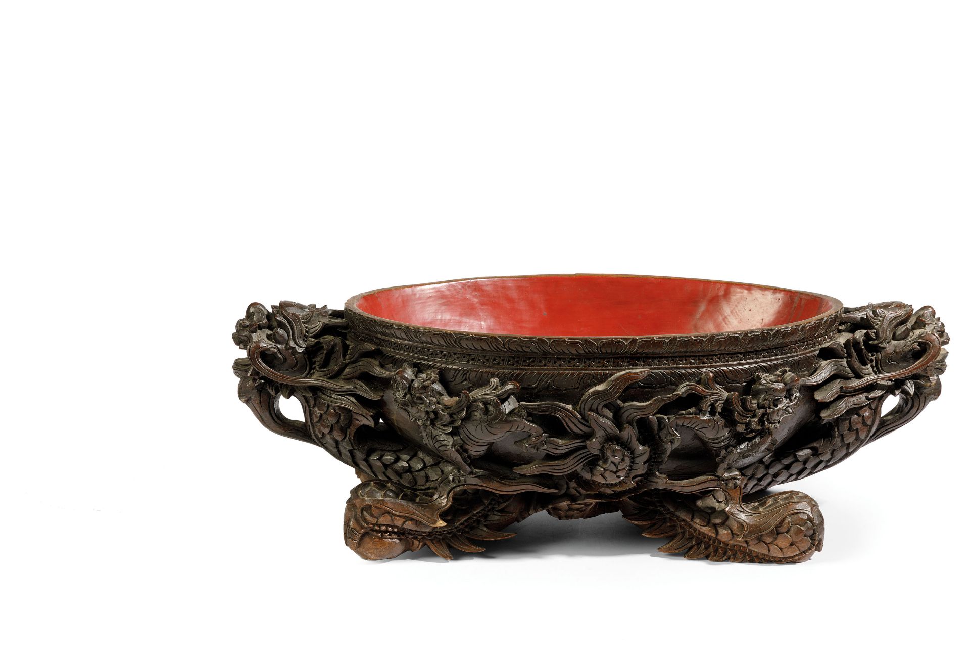 A VERY LARGE OVAL WOOD AND RED-LACQUERED DRAGON BOWL, CHINA, QING DYNASTY, REPUBLIC PERIOD