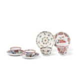 THREE FAMILLE ROSE PORCELAIN CUPS AND SAUCERS AND A FAMILLE VERTE CUP AND SAUCER, CHINA,
