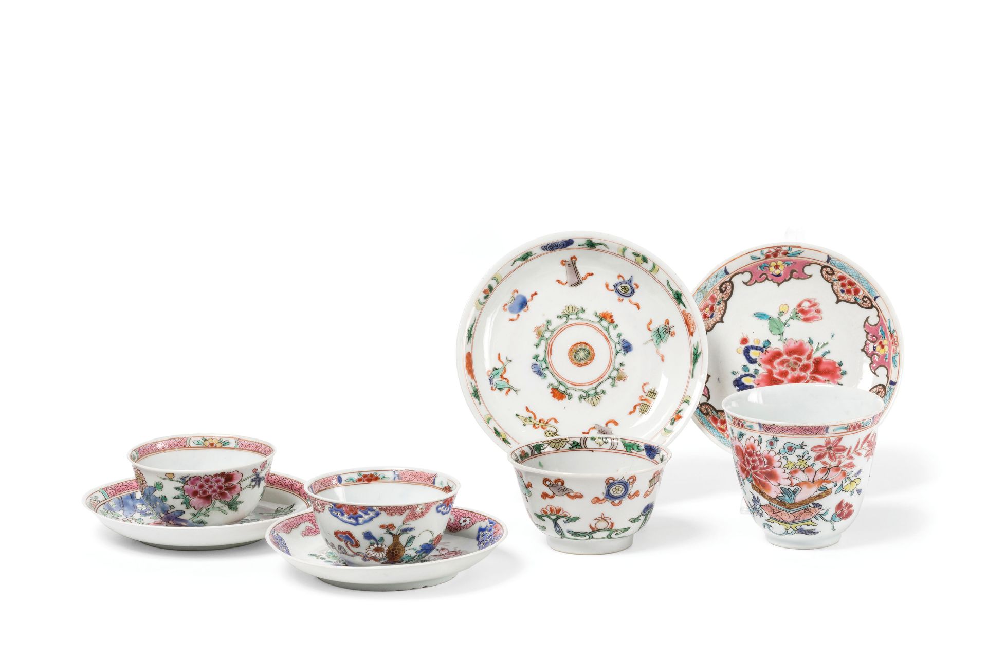 THREE FAMILLE ROSE PORCELAIN CUPS AND SAUCERS AND A FAMILLE VERTE CUP AND SAUCER, CHINA,
