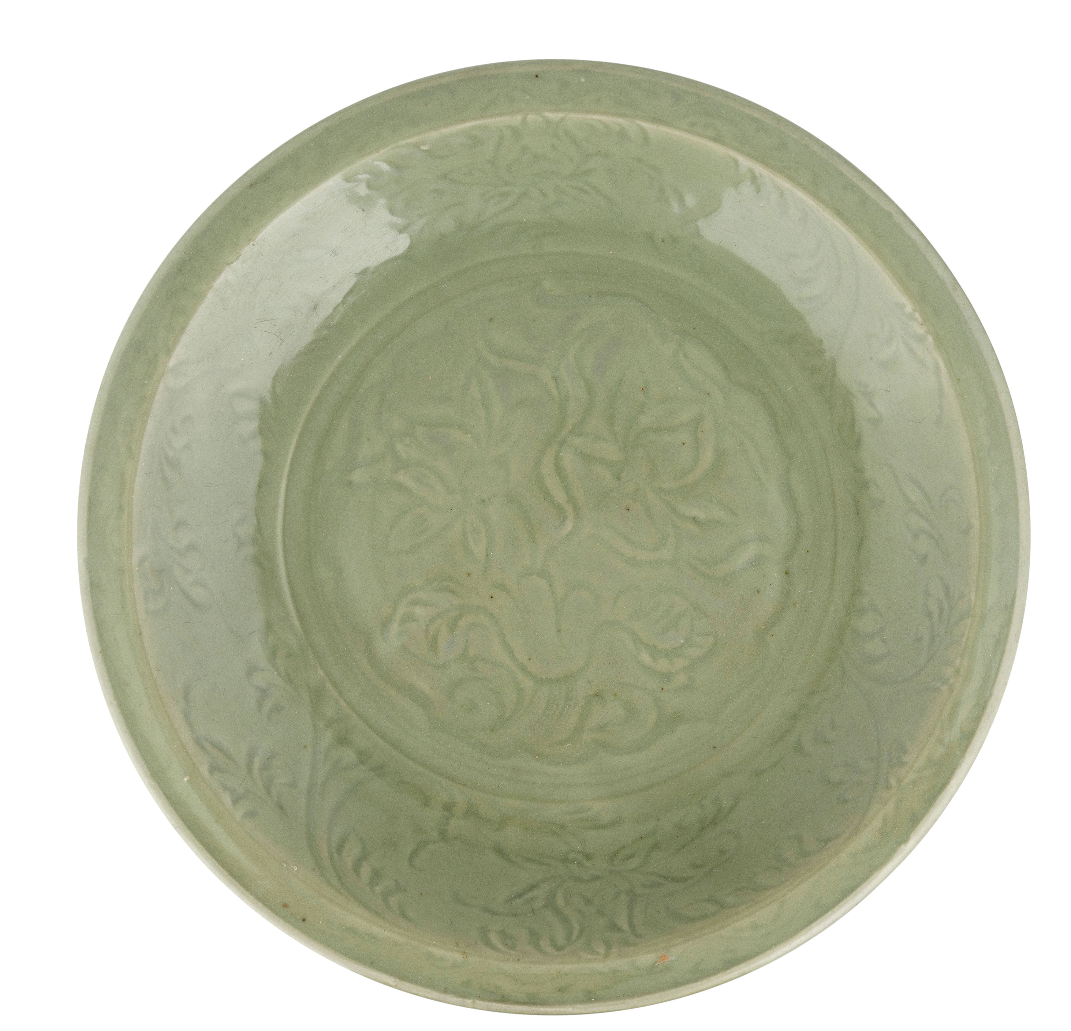 A LARGE CARVED CELADON LONGQUAN DISH, CHINA, MING DYNASTY, 15TH CENTURY