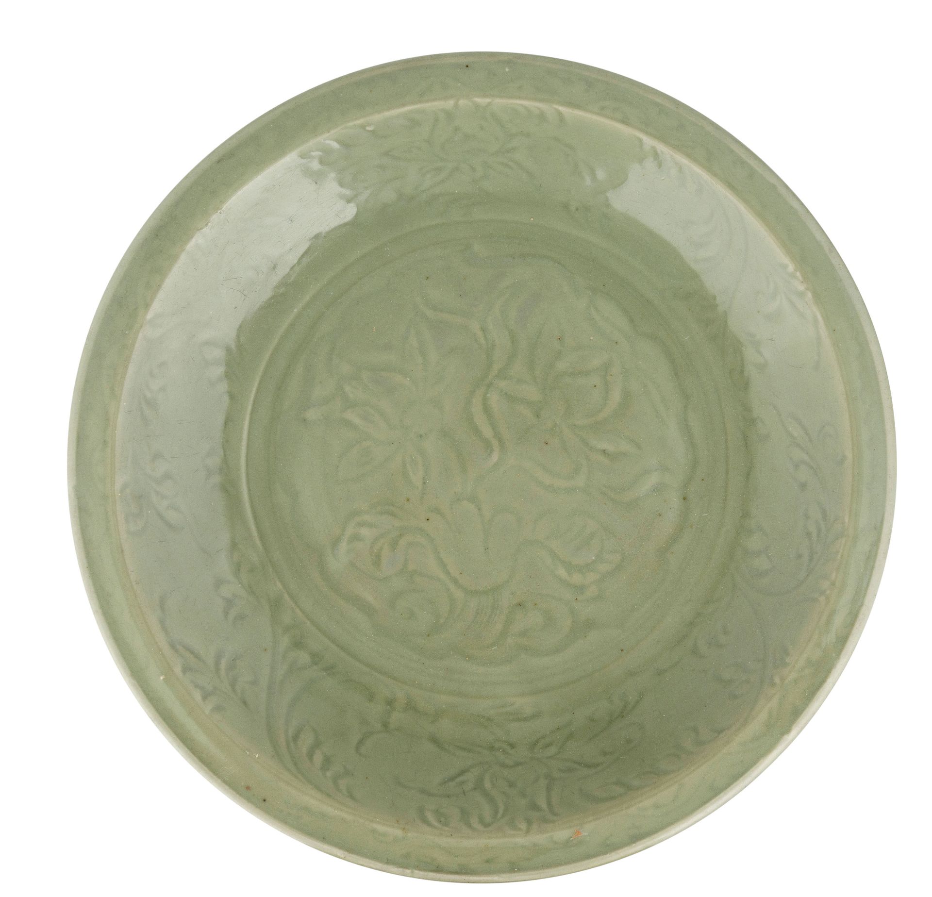 A LARGE CARVED CELADON LONGQUAN DISH, CHINA, MING DYNASTY, 15TH CENTURY