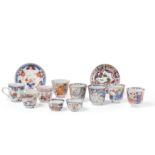 NINE ASSORTED IMARI PORCELAIN CUPS AND TWO SAUCERS, AND ONE FAMILLE ROSE CUP, CHINA, 18TH CENTURY