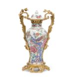 AN ORMOLU-MOUNTED FAMILLE ROSE PORCELAIN POTICHE AND COVER, CHINA, 18TH CENTURY, THE EUROPEAN MOUNT