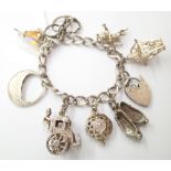 925 silver charm bracelet with seven charms 33g