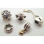 Five authentic Pandora silver bead charms