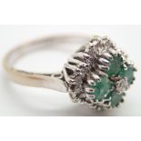 18ct white gold emerald and diamond cluster ring size M