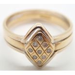 Presumed high carat white and yellow gold and diamond ring size M/N with Egyptian marks