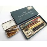 Vintage dip pens and a box of nibs