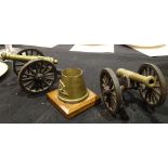 Two brass cannons and a Royal Artillery ashtray