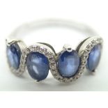 14ct white gold blue sapphire and diamond set ring with valuation certificate of £1600 dated 2015