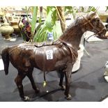 Leather horse with saddle H: 50 cm