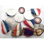 Collection of mixed medals and a badge