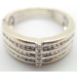 9ct white gold diamond buckle style ring size N/O