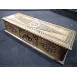 Heavily carved antique wooden glove box