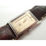 Gents Emporio Armani wristwatch on leather strap CONDITION REPORT: This item was