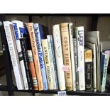 Shelf of books on firearms etc