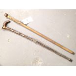 Two vintage walking sticks including example with cased crocodile handle and stem