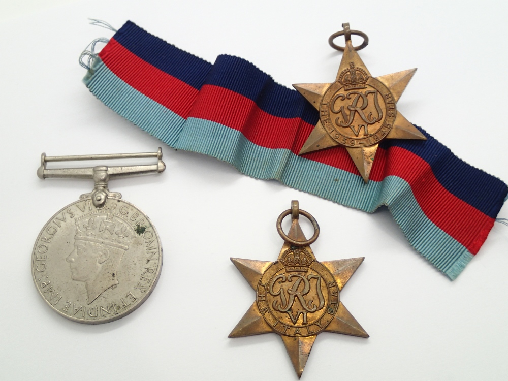 Three WWII medals one with ribbon