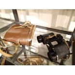 Pair of leather cased French Denhill 8 x 32 binoculars