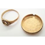 Gold plated watch back and a ring lacking stone (marks rubbed but probably 18ct gold) 3.