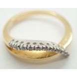 18ct yellow gold crossover stone set ring size P 4.