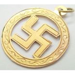 9ct yellow gold Swastika pendant D: 18 mm