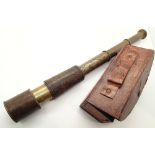 Brass and leather telescope marked Dolland