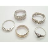 Five sterling silver rings,