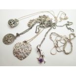 Five sterling silver necklaces with pendants