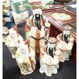 Five Oriental figurines tallest H: 36 cm