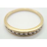 18ct gold ring set with twelve diamonds size O 2.