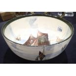 Royal Doulton bowl decorated with fishing boats on cream background