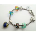Sterling silver fancy bracelet with bead charms