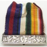 Medal ribbon with solid silver ornate bar