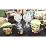 Two crystal candle holders and three Royal Doulton character jugs