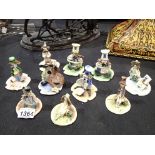 Nine signed Italian ceramic figurines