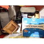 Box of mixed cameras including Sony Handycam CONDITION REPORT: Uncharged at present