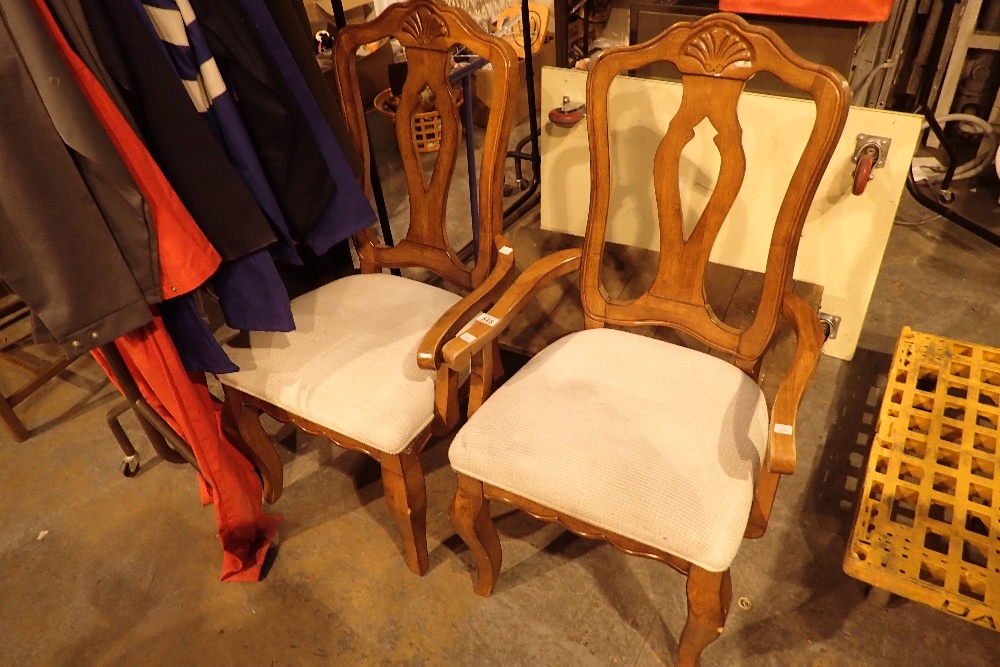 Two moulded wood carvers with upholstered seats