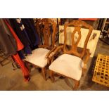 Two moulded wood carvers with upholstered seats