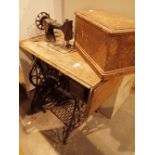 Oak cased Singer sewing machine with cast metal frame