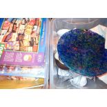 Two boxes of mixed items including jigsaws crystal etc