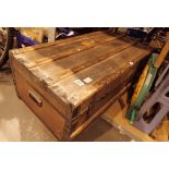 Large wood bound luggage trunk with original liner table