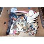 Box of various figurines, umbrella,