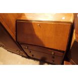 Vintage dropfront bureau over three drawers